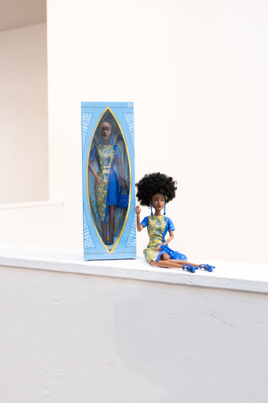 Black girl doll with natural hair and storybook gift set in the UK